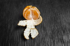 Tangerines on a black background. Lots of fresh fruit - mandarins. stock image Tangerines on a black background. Lots of fresh fruit - mandarins. stock image