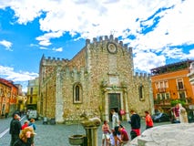 Taormina, Sicily, Italy - May 05, 2014: The people near Duomo Catherdal in Taormina city in Sicily. royalty free stock images Taormina, Sicily, Italy - May 05, 2014: The people near Duomo Catherdal in Taormina city in Sicily. royalty free stock images