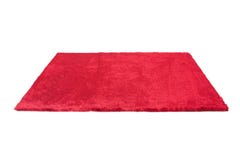 Tappeto simile a pelliccia rosso Isolato fotografia stock libera da diritti Tappeto simile a pelliccia rosso Isolato fotografia stock libera da diritti