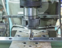 Tapping metal box by machine royalty free stock photos Tapping metal box by machine royalty free stock photos