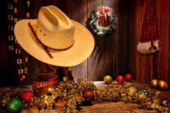 Tarjeta de Navidad del oeste americana del sombrero de vaquero del rodeo imágenes de archivo libres de regalías Tarjeta de Navidad del oeste americana del sombrero de vaquero del rodeo imágenes de archivo libres de regalías