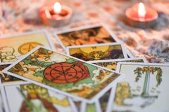 Tarot card with candlelight on the darkness background for Astrology Occult Magic illustration / Magic Spiritual Horoscopes and