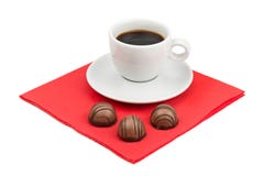 Tasse de café et des bonbons au chocolat images libres de droits Tasse de café et des bonbons au chocolat images libres de droits