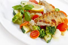 A Tasty food .Grilled fish and vegetables. High quality image