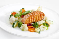 A Tasty food .Grilled salmon and vegetables. High quality image