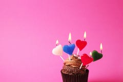 Tasty home made baked birthday muffin sweets. Yummy bakery products bad for figure. Unhealthy sweets. Holiday christmas, womens mo stock image Tasty home made baked birthday muffin sweets. Yummy bakery products bad for figure. Unhealthy sweets. Holiday christmas, womens mo stock image