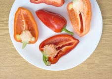 Tasty Sweet Peppers On White Plate Top View Closeu Royalty Free Stock Image