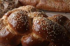 Tasty wicker bun with sesame on the board close-up royalty free stock photos Tasty wicker bun with sesame on the board close-up royalty free stock photos
