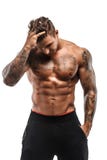 Tatuerad muskulös grabb royaltyfria bilder Tatuerad muskulös grabb royaltyfria bilder