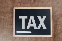 TAX, Motivational Business Words Quotes Concept stock photo TAX, Motivational Business Words Quotes Concept stock photo