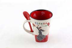 Tazza spagnola del coffe e piccolo cucchiaio, ricordo per i turisti immagini stock libere da diritti Tazza spagnola del coffe e piccolo cucchiaio, ricordo per i turisti immagini stock libere da diritti