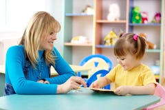 Teacher with child in preschool royalty free stock images Teacher with child in preschool royalty free stock images