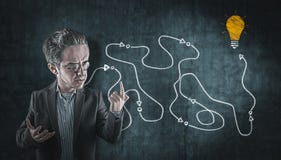 Teacher explains the creative process. stock photo Teacher explains the creative process. stock photo