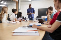 Teacher In Lesson For College Students Studying CAD/3D Design royalty free stock images Teacher In Lesson For College Students Studying CAD/3D Design royalty free stock images