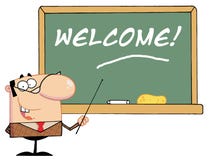 Teacher Pointing To A Welcome Chalkboard Stock Image Teacher Pointing To A Welcome Chalkboard Stock Image