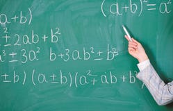 Teacher on school lesson at blackboard. Back to school. Teachers day. Study and education. Modern school. Knowledge day royalty free stock photo Teacher on school lesson at blackboard. Back to school. Teachers day. Study and education. Modern school. Knowledge day royalty free stock photo