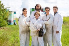 Team Of Confident Beekeepers At Apiary royalty free stock photos Team Of Confident Beekeepers At Apiary royalty free stock photos