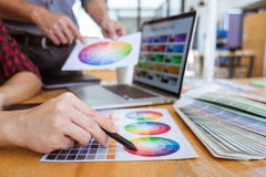 Team of Creative graphic designer meeting working on new project, choose selection color and drawing on graphics tablet with work royalty free stock photo Team of Creative graphic designer meeting working on new project, choose selection color and drawing on graphics tablet with work royalty free stock photo