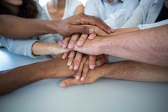 Team of graphic designers forming handstack royalty free stock photography Team of graphic designers forming handstack royalty free stock photography