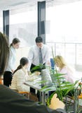 Team meeting. Working together. Conceptual shot for teamwork Team meeting. Working together. Conceptual shot for teamwork