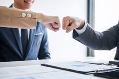 Teamwork of businessman partnership giving fist bump to greeting start up business strategy project royalty free stock photos Teamwork of businessman partnership giving fist bump to greeting start up business strategy project royalty free stock photos