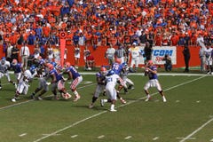Tebow drops back to pass