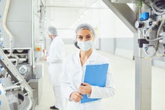 Technologist woman at food factory . stock photos Technologist woman at food factory . stock photos