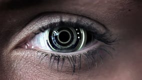 Technology code design in human eye stock footage Technology code design in human eye stock footage