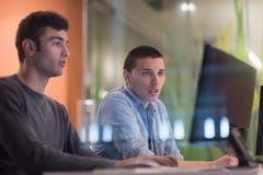 Technology students group working in computer lab school class Stock Photos Technology students group working in computer lab school class Stock Photos