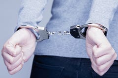 Teen with her hands handcuffed in criminal concept royalty free stock photo Teen with her hands handcuffed in criminal concept royalty free stock photo