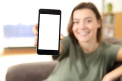 Teen showing a blank smart phone screen in a house Royalty Free Stock Photo Teen showing a blank smart phone screen in a house Royalty Free Stock Photo
