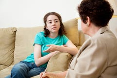 Teen Speaking With Counselor Royalty Free Stock Image