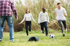 Teenage friends playing football royalty free stock photo Teenage friends playing football royalty free stock photo