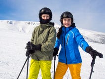 Teenage girl and boy skiing royalty free stock images Teenage girl and boy skiing royalty free stock images