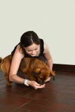 Teenage girl plays with her little puppy dog stock photos Teenage girl plays with her little puppy dog stock photos