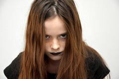 Teenage girl in gothic style looking very angry stock image Teenage girl in gothic style looking very angry stock image