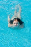 Teenage girl swim underwater royalty free stock photo Teenage girl swim underwater royalty free stock photo