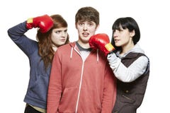 Teenage siblings fighting with boxing gloves royalty free stock photos Teenage siblings fighting with boxing gloves royalty free stock photos
