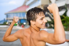 Teenager standing near hotel on resort in evening royalty free stock photo Teenager standing near hotel on resort in evening royalty free stock photo