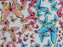 Tela blanca con las mariposas pintadas Foto de archivo libre de regalías Tela blanca con las mariposas pintadas Foto de archivo libre de regalías