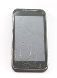 Telefono cellulare con uno schermo rotto fotografia stock Telefono cellulare con uno schermo rotto fotografia stock