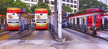 Tenez le premier rôle le terminus d'autobus de ferry, tsui de sha de tsim, Hong Kong photographie stock libre de droits Tenez le premier rôle le terminus d'autobus de ferry, tsui de sha de tsim, Hong Kong photographie stock libre de droits