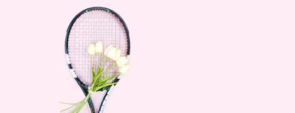 Tennis Love Layout On Pastel Pink Background With Tennis Racket With Bouquet White Tulips Flowers. International Women`s Day March Royalty Free Stock Photography