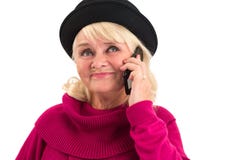 Tenuta femminile senior un cellulare fotografie stock Tenuta femminile senior un cellulare fotografie stock