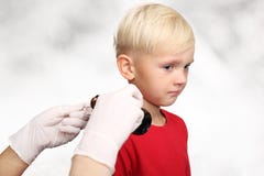 This is terrible! The boy does not want to drink medicine Royalty Free Stock Photos This is terrible! The boy does not want to drink medicine Royalty Free Stock Photos