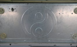 Teste padrão de alumínio da placa do yin yang É a parte da caixa do computador fotografia de stock Teste padrão de alumínio da placa do yin yang É a parte da caixa do computador fotografia de stock