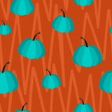 Teste padrão sem emenda do vetor de abóboras azuis no fundo alaranjado ilustração royalty free Teste padrão sem emenda do vetor de abóboras azuis no fundo alaranjado ilustração royalty free