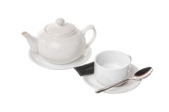 Tetera y blanco aislado taza vacía fotografía de archivo Tetera y blanco aislado taza vacía fotografía de archivo