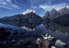Tetons grande refletido no lago jenny imagem de stock Tetons grande refletido no lago jenny imagem de stock
