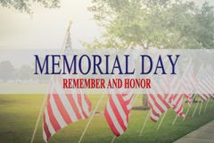 Text Memorial Day and honor on row of lawn American Flags stock images Text Memorial Day and honor on row of lawn American Flags stock images